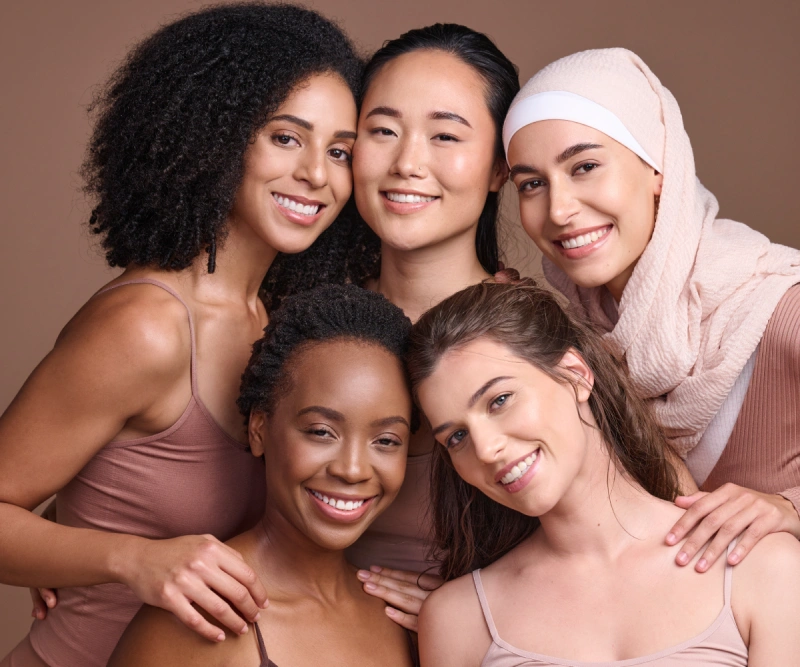 a group of women posing for a photo